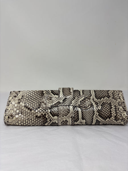 Tod’s python clutch with silver embelishments