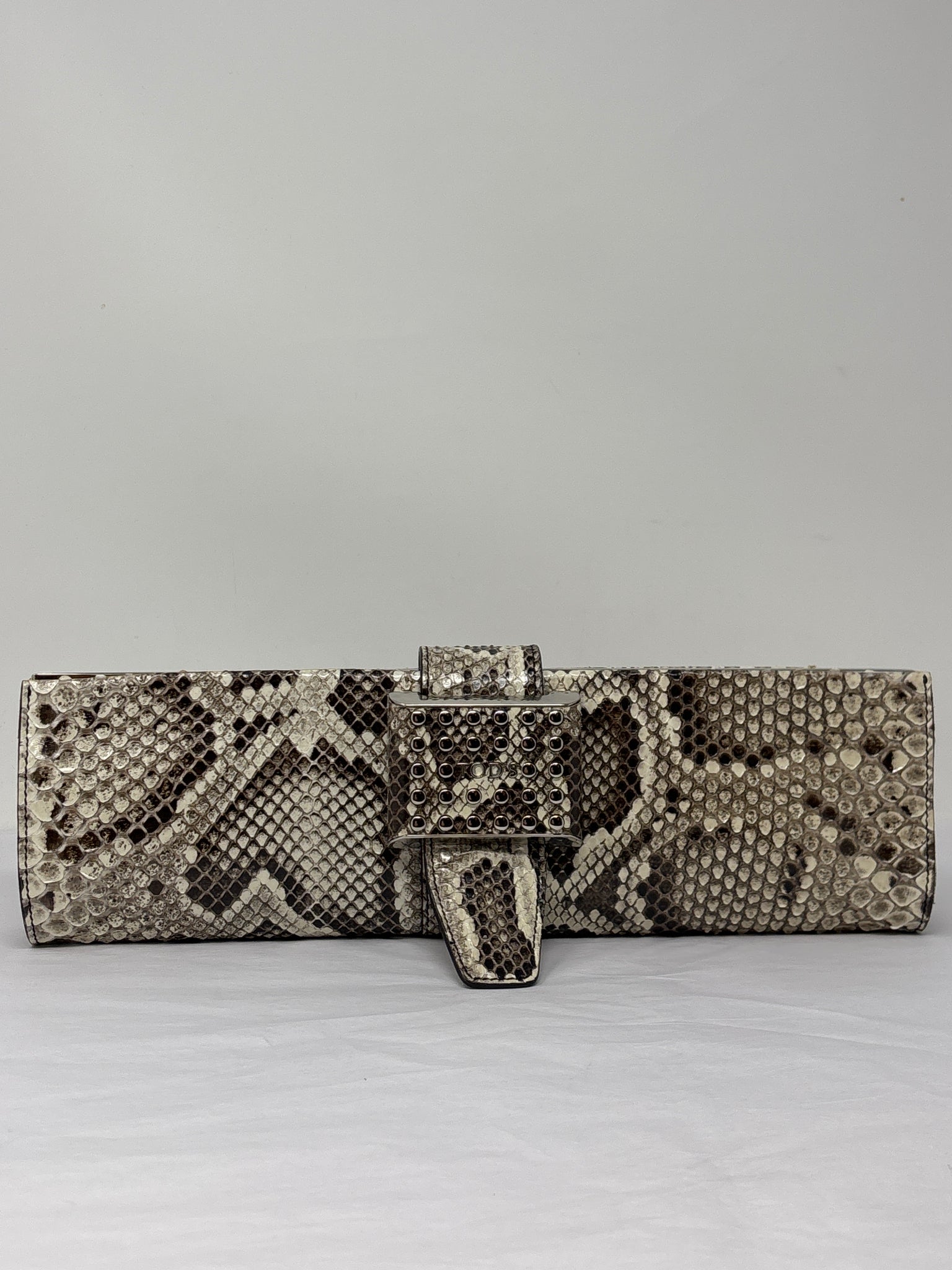 Tod’s python clutch with silver embelishments