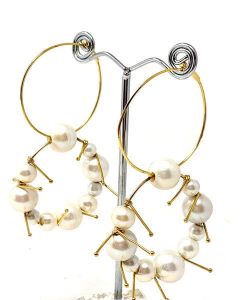 Jil Sander: pearl-embellished hooped earrings